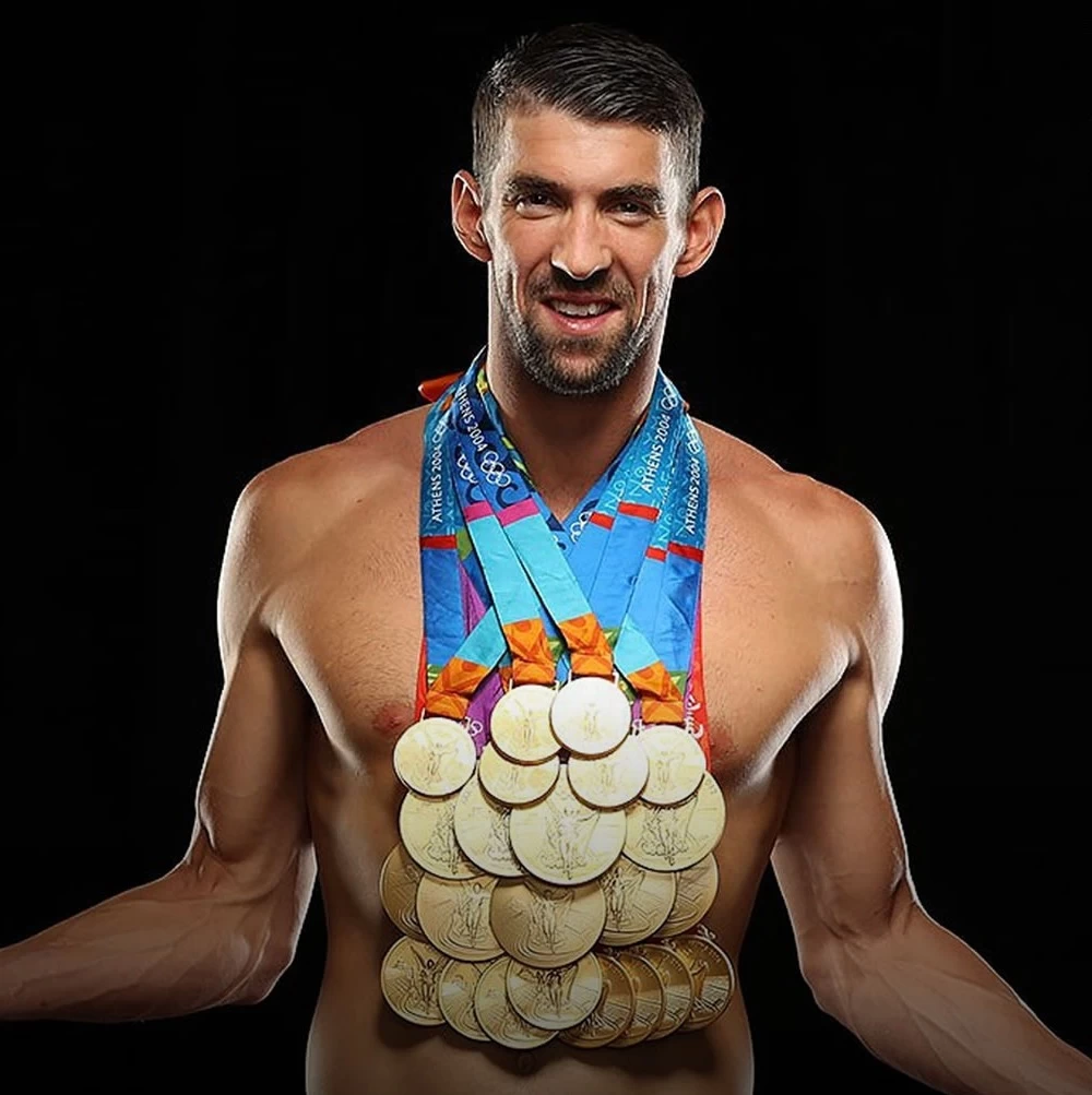 Michael Phelps e sua enorme coleção de medalhas